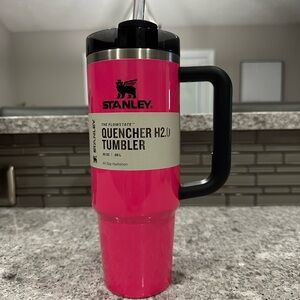 NWT Neon Pink and black 20 oz Stanley tumbler.